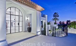 Delightful, completely renovated luxury villa with golf and sea views for sale in Nueva Andalucía, Marbella 19863 