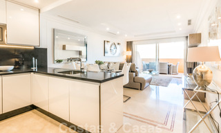 Beautiful apartment with large terrace and nice sea views for sale in a luxury complex with lots of facilities in Nueva Andalucia, Marbella 20100 