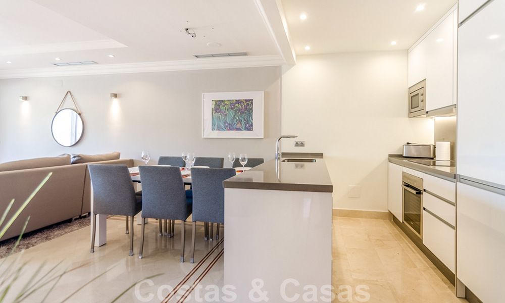 Spacious, fully renovated apartment with sea views for sale in a prestigious complex with many amenities in Nueva Andalucia, Marbella 20198
