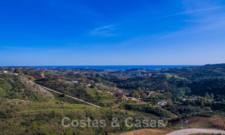 Attractive south facing building plot with spectacular views for sale, in a world class golf resort, Mijas, Costa del Sol 24097 