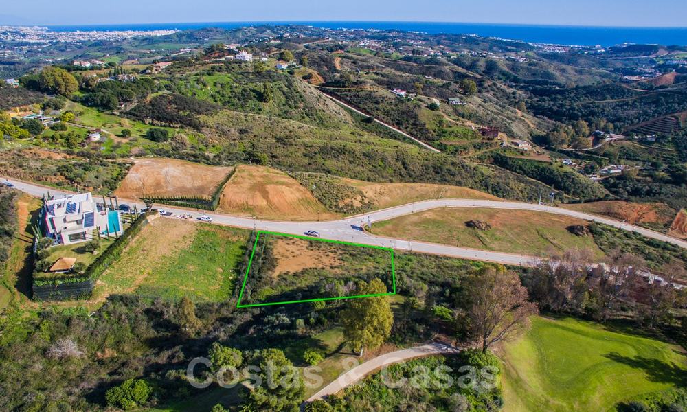Attractive south facing building plot with spectacular views for sale, in a world class golf resort, Mijas, Costa del Sol 24099