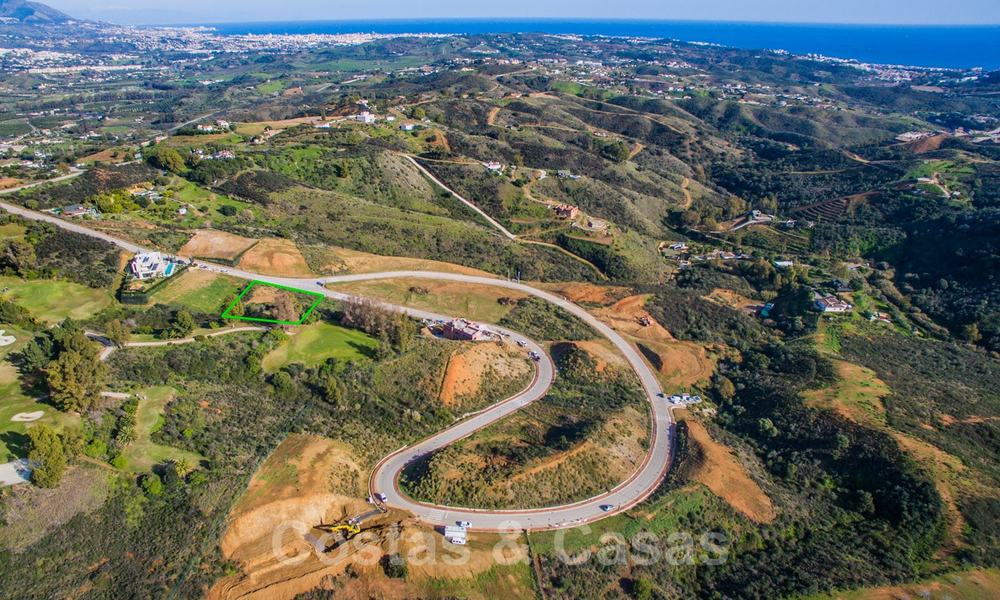 Attractive south facing building plot with spectacular views for sale, in a world class golf resort, Mijas, Costa del Sol 24100