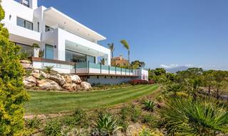 SOLD. Super luxurious contemporary villa with sea and mountain views for sale in the Golden Triangle of Benahavis, Estepona, Marbella 25440 