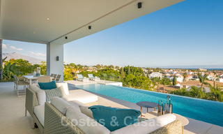 SOLD. Super luxurious contemporary villa with sea and mountain views for sale in the Golden Triangle of Benahavis, Estepona, Marbella 29805 