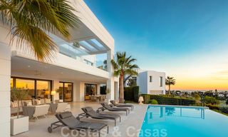 Elegant, contemporary luxury villa with sea views for sale in sought-after Nueva Andalucia, Marbella 20905 