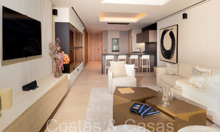 New ultra-deluxe frontline beach apartments for sale, near the centre and marina of Estepona 64839 