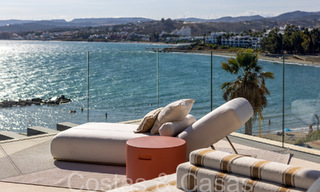 New ultra-deluxe frontline beach apartments for sale, near the centre and marina of Estepona 64867 