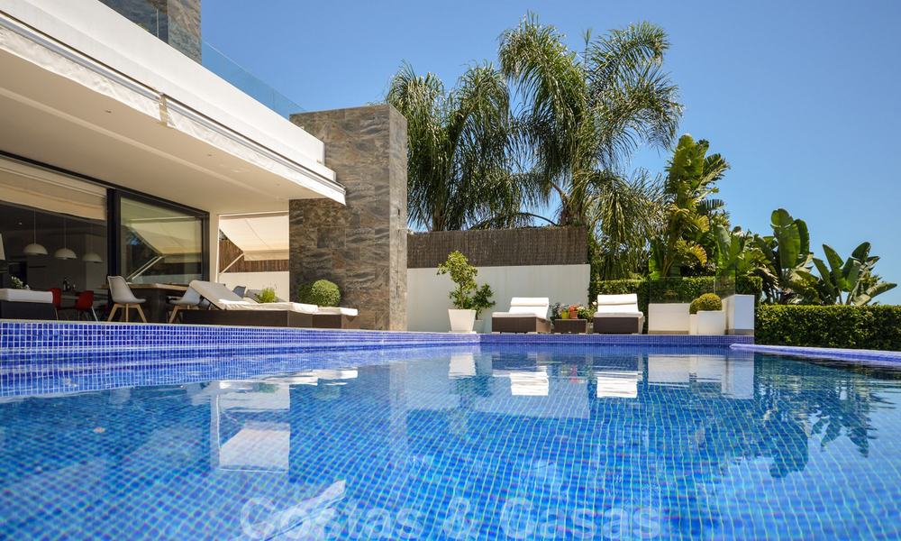 Modern luxury villa with panoramic sea views for sale in the prestigious Golden Mile of Marbella 21005