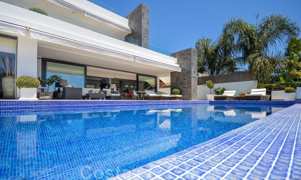 Modern luxury villa with panoramic sea views for sale in the prestigious Golden Mile of Marbella 21009