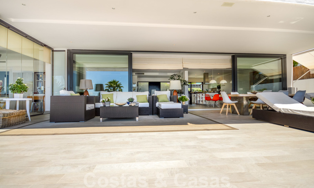 Modern luxury villa with panoramic sea views for sale in the prestigious Golden Mile of Marbella 21010