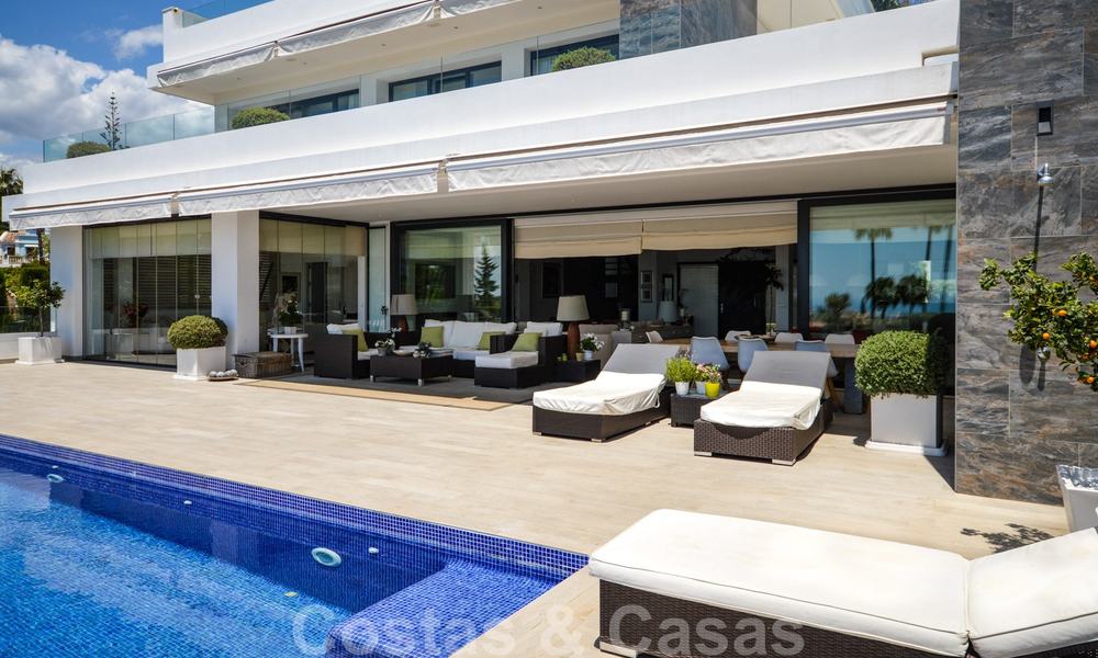 Modern luxury villa with panoramic sea views for sale in the prestigious Golden Mile of Marbella 21012