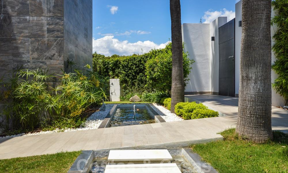 Modern luxury villa with panoramic sea views for sale in the prestigious Golden Mile of Marbella 21014