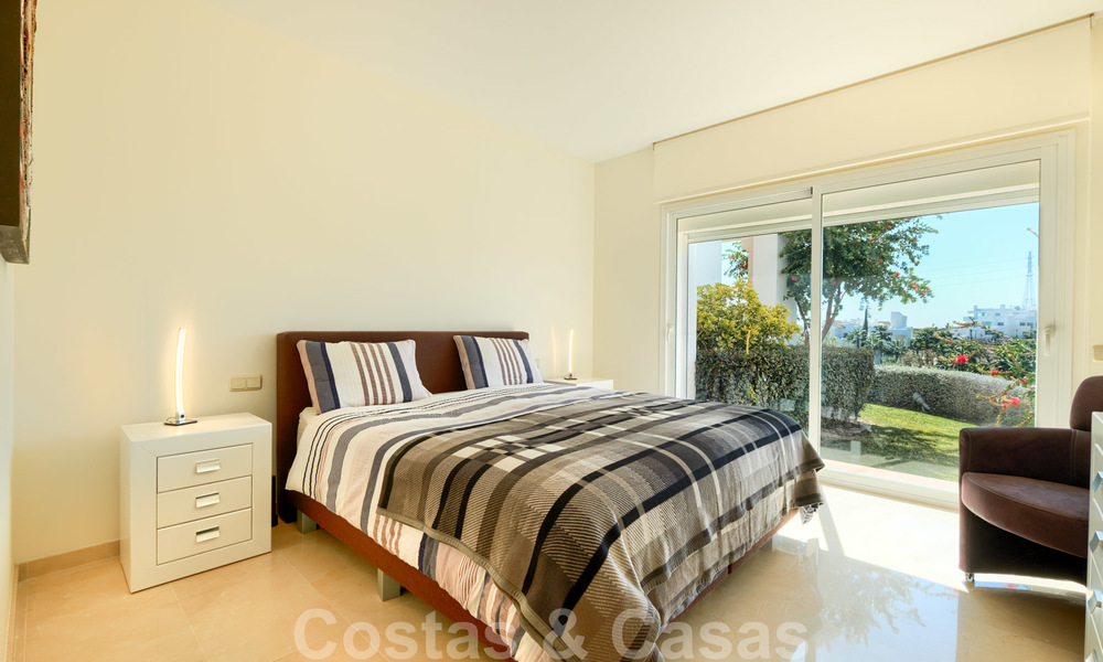 Contemporary garden corner apartment for sale in a residential development with private lagoon, Casares, Costa del Sol 23601