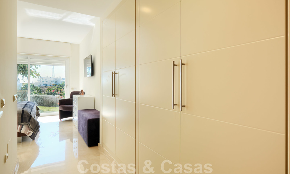 Contemporary garden corner apartment for sale in a residential development with private lagoon, Casares, Costa del Sol 23603