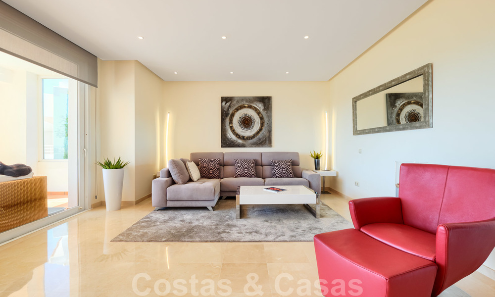 Contemporary garden corner apartment for sale in a residential development with private lagoon, Casares, Costa del Sol 23604