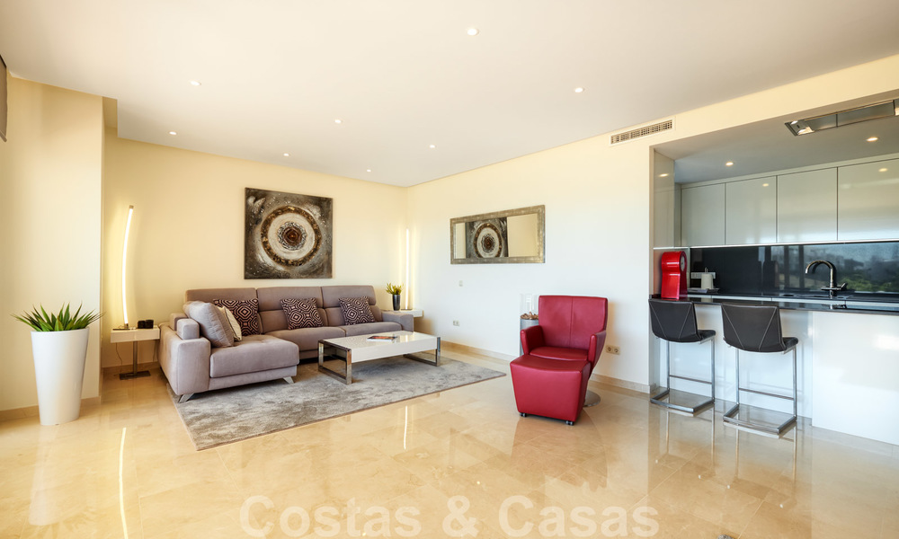 Contemporary garden corner apartment for sale in a residential development with private lagoon, Casares, Costa del Sol 23605