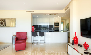 Contemporary garden corner apartment for sale in a residential development with private lagoon, Casares, Costa del Sol 23606 