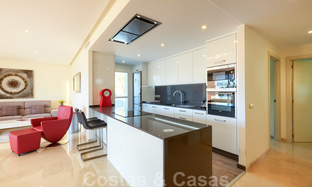 Contemporary garden corner apartment for sale in a residential development with private lagoon, Casares, Costa del Sol 23607