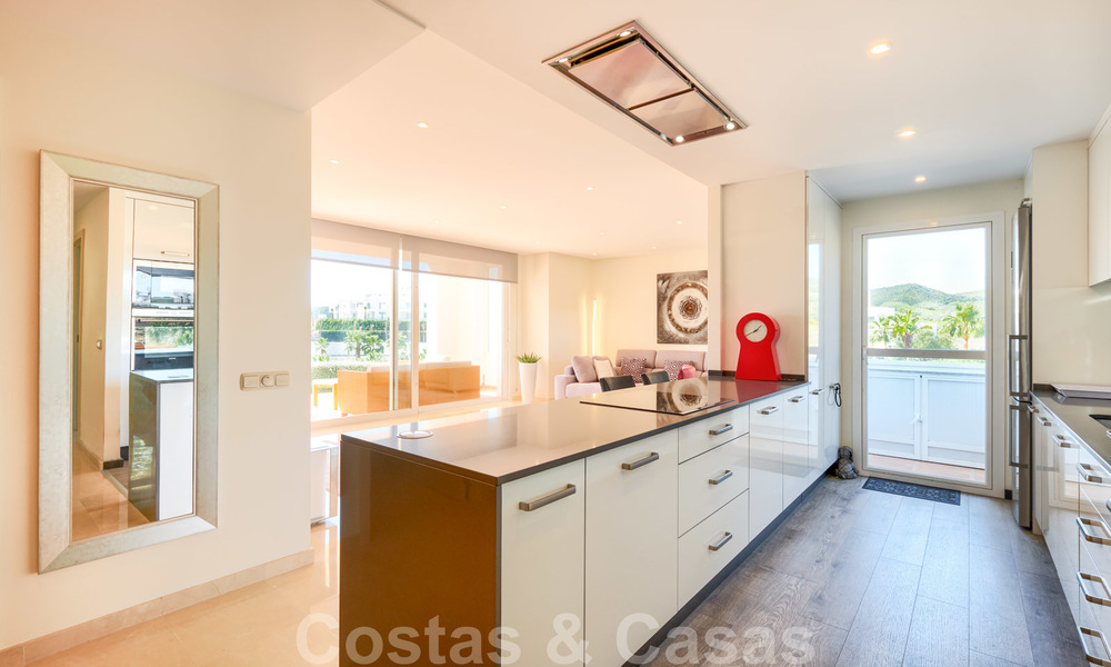 Contemporary garden corner apartment for sale in a residential development with private lagoon, Casares, Costa del Sol 23609