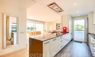 Contemporary garden corner apartment for sale in a residential development with private lagoon, Casares, Costa del Sol 23609 