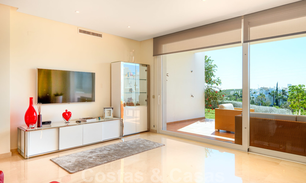 Contemporary garden corner apartment for sale in a residential development with private lagoon, Casares, Costa del Sol 23610