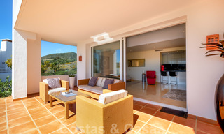 Contemporary garden corner apartment for sale in a residential development with private lagoon, Casares, Costa del Sol 23612 