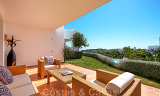 Contemporary garden corner apartment for sale in a residential development with private lagoon, Casares, Costa del Sol 23614 