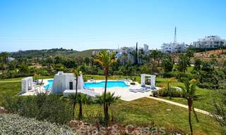 Contemporary garden corner apartment for sale in a residential development with private lagoon, Casares, Costa del Sol 23617 