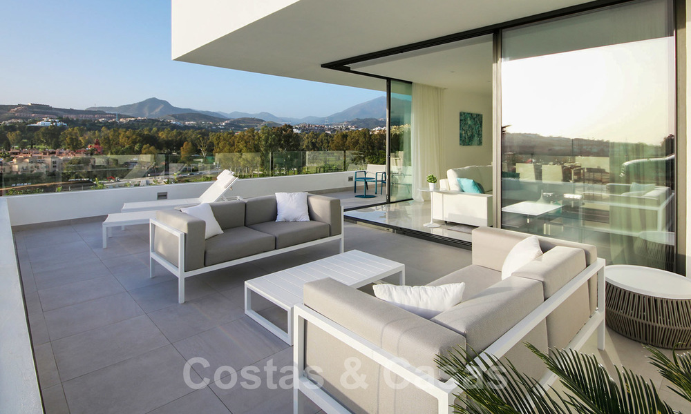 New ready to move in modern design apartment for sale, on the golf course between Marbella and Estepona 24847