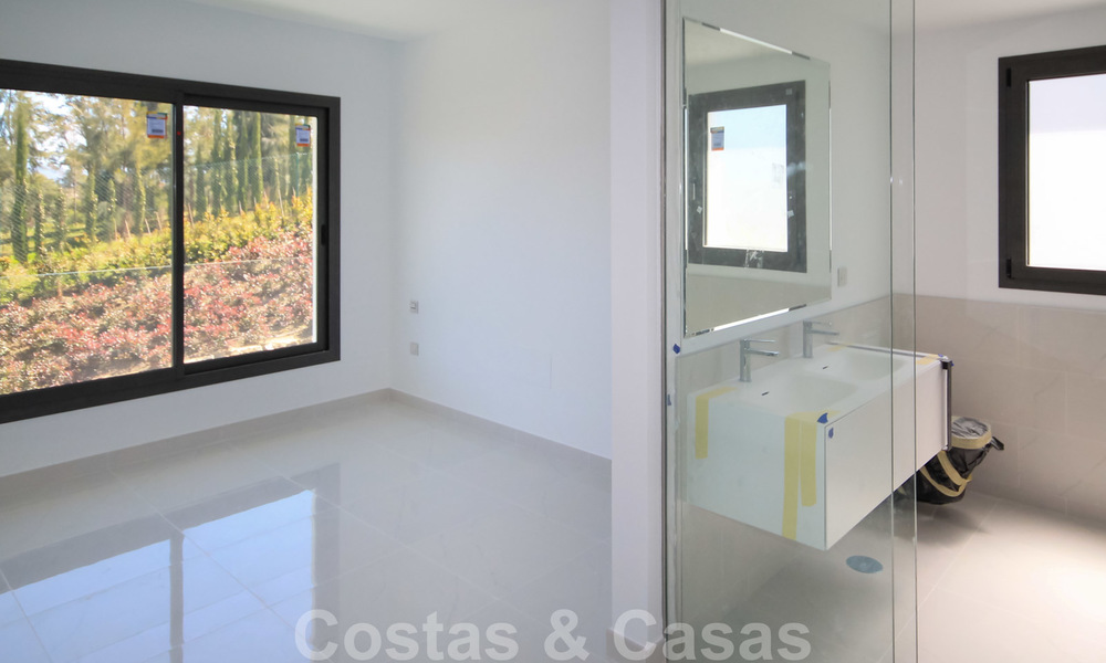 New ready to move in modern design apartment for sale, on the golf course between Marbella and Estepona 24852