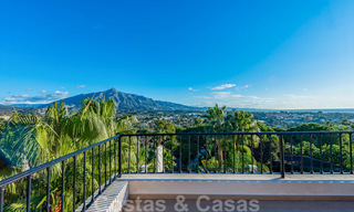 Large luxury villa for sale with stunning panoramic views over the golf valley, the mountains and the Mediterranean Sea in Nueva Andalucia, Marbella 24995 