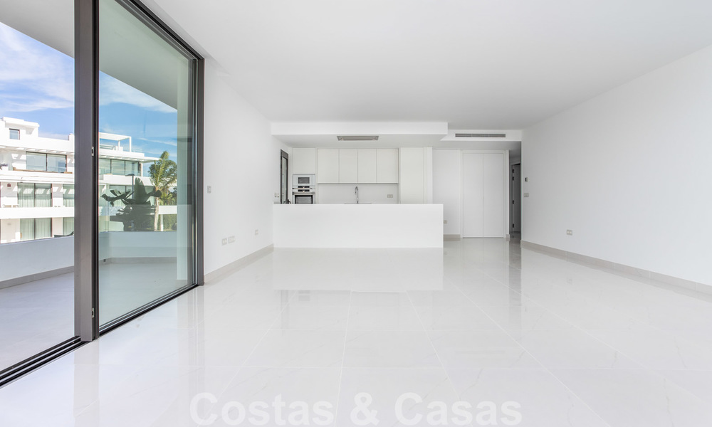 Modern design apartment for sale with spacious terrace, adjacent to the golf course in Marbella - Estepona. Ready to move in. Reduced in price. 25380