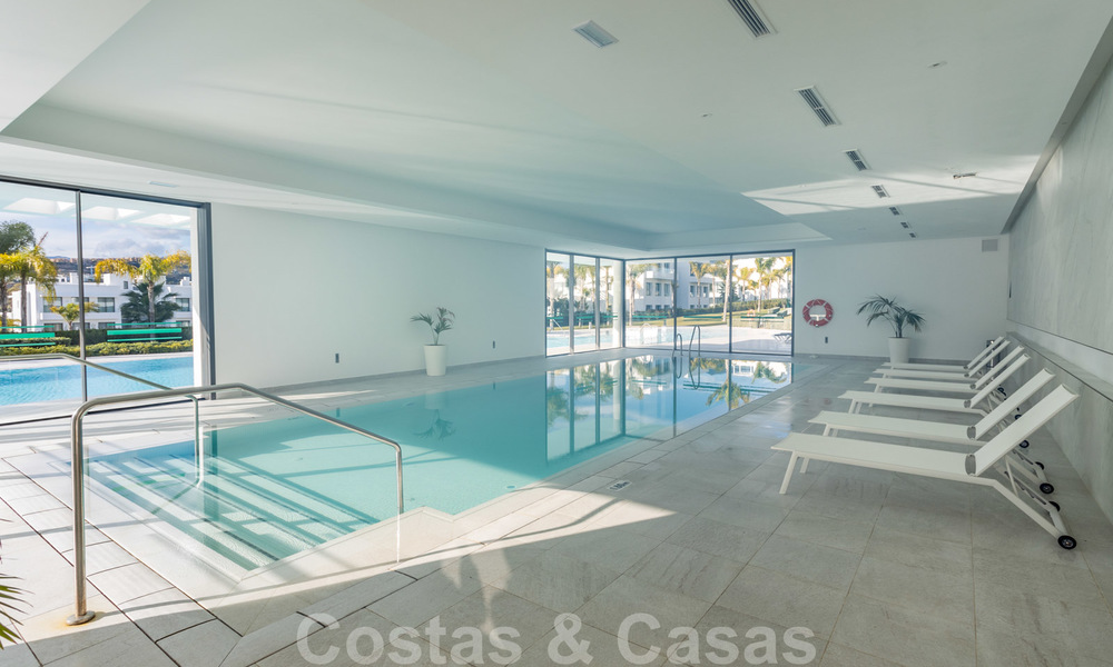 Modern design apartment for sale with spacious terrace, adjacent to the golf course in Marbella - Estepona. Ready to move in. Reduced in price. 25392
