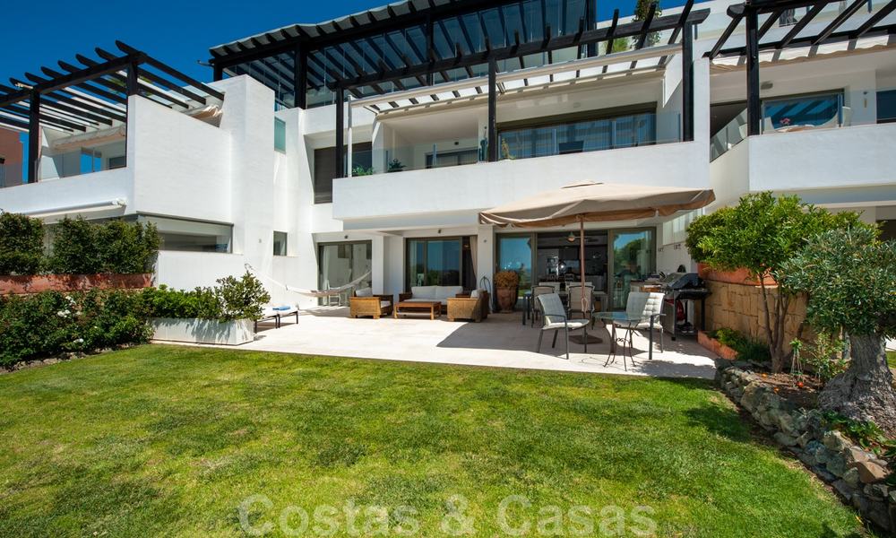 Modern front-line golf apartment with beautiful golf and sea views for sale in Los Flamingos Golf in Marbella - Benahavis 25124