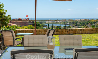Modern front-line golf apartment with beautiful golf and sea views for sale in Los Flamingos Golf in Marbella - Benahavis 25127 