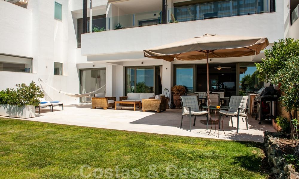 Modern front-line golf apartment with beautiful golf and sea views for sale in Los Flamingos Golf in Marbella - Benahavis 25135