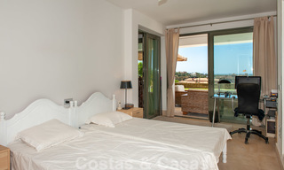 Modern front-line golf apartment with beautiful golf and sea views for sale in Los Flamingos Golf in Marbella - Benahavis 25137 