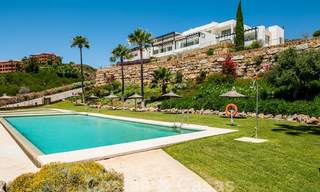 Modern front-line golf apartment with beautiful golf and sea views for sale in Los Flamingos Golf in Marbella - Benahavis 25149 