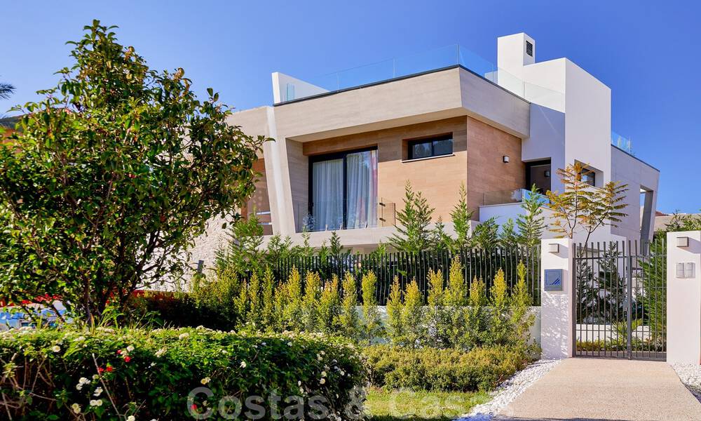 Modern, semi-detached villas for sale at 300 meters from the beach in Puerto Banus, Marbella 31644