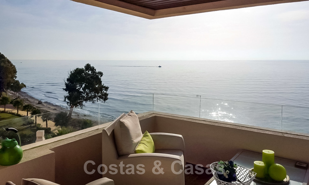 Opportunity! Modern apartment for sale on the first row of a frontline beach complex with open sea views between Marbella and Estepona 25514