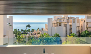 Modern apartment for sale in a front-line beach complex with sea views between Marbella and Estepona 25554 