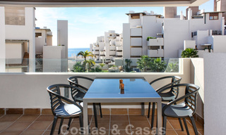Modern apartment for sale in a frontline beach complex with sea views between Marbella and Estepona 25611 