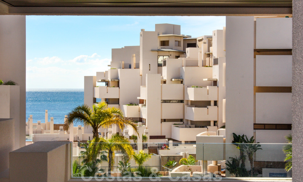 Modern apartment for sale in a frontline beach complex with sea views between Marbella and Estepona 25616