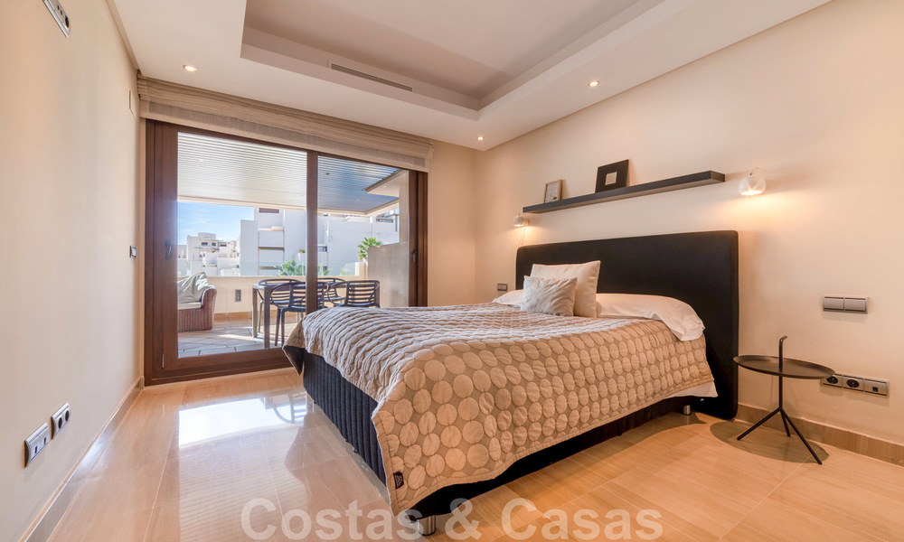 Modern apartment for sale in a frontline beach complex with sea views between Marbella and Estepona 25631