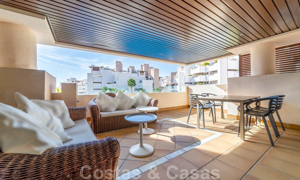 Modern apartment for sale in a frontline beach complex with sea views between Marbella and Estepona 25639
