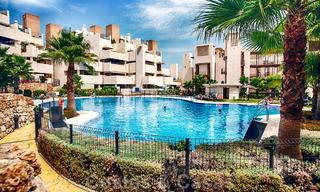Modern apartment for sale in a first line beach complex with private pool between Marbella and Estepona. Huge price drop! 25689 