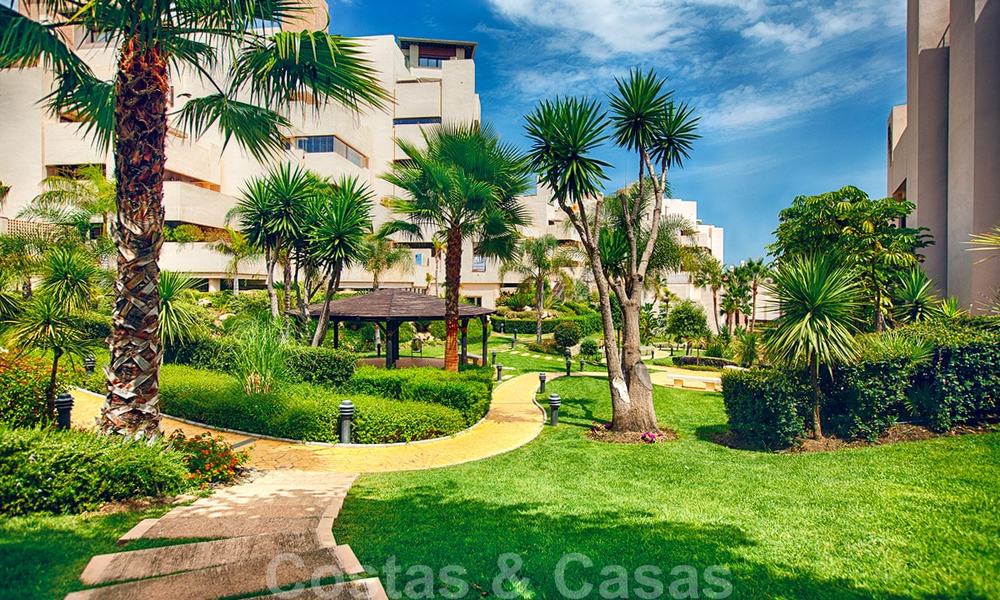 Modern apartment for sale in a first line beach complex with private pool between Marbella and Estepona. Huge price drop! 25690
