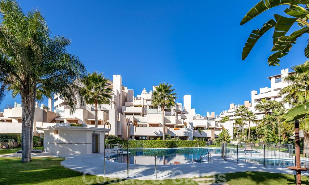 Modern apartment for sale in a first line beach complex with private pool between Marbella and Estepona. Huge price drop! 25696