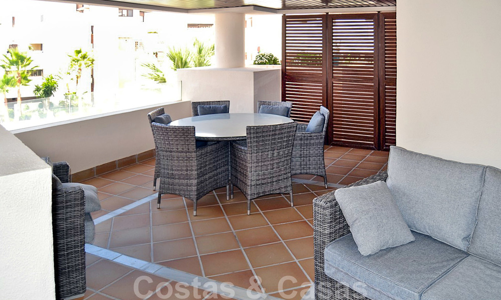Modern apartment for sale in a first line beach complex with sea view, between Marbella and Estepona 25724