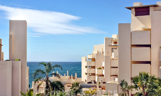 Modern apartment for sale in a first line beach complex with sea view, between Marbella and Estepona 25728 